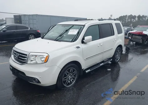 2015 Honda Pilot Touring z USA, uszkodzony, nr VIN 5FNYF4H99FB029826